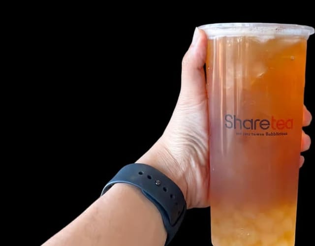 Orange Earl Grey Tea W/ Aloe Vera and Crystal Boba.